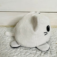 Reversible kitty skeleton plush