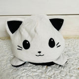 Reversible kitty skeleton plush